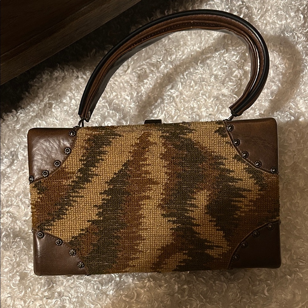 Tapestry studded Train purse by Soure’ New York. Great vintage condition